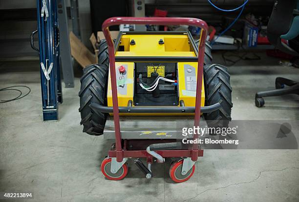 The Clearpath Robotics Inc. Husky robot sits on a dolly at the company's facility in Kitchener, Ontario, Canada, on Friday, July 24, 2015. Clearpath...