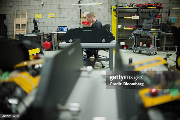 An engineer hand assembles the Husky robot at the Clearpath Robotics Inc. Facility in Kitchener, Ontario, Canada, on Friday, July 24, 2015. Clearpath...