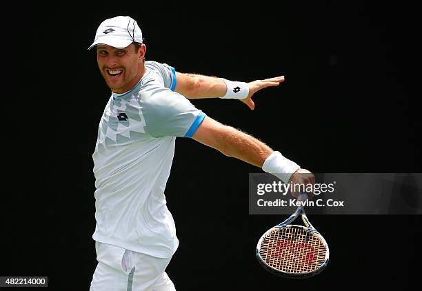 Michael Berrer of Germany returns a backhand to Benjamin Becker of Germany during the BB&T Atlanta Open at Atlantic Station on July 28, 2015 in...