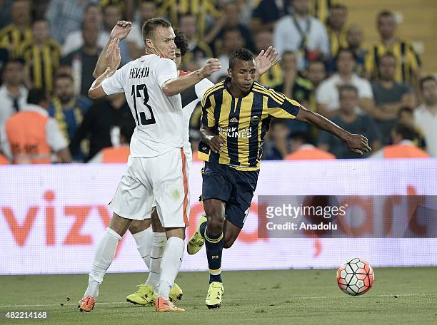 Nani of Fenerbahce vies with Vyacheslav Shevchuk of Shakhtar Donetsk during UEFA Champions League Third Qualifying Round 1st Leg match between...