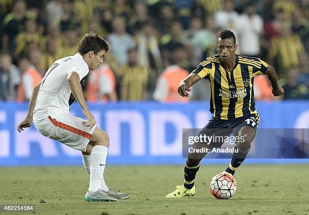 Nani of Fenerbahce vies with Maksym Malyshev of Shakhtar Donetsk during UEFA Champions League Third Qualifying Round 1st Leg match between Fenerbahce...