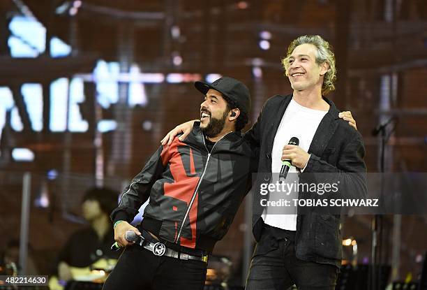 German Muslim singer Adel Tawil from the band 'Ich & Ich' and US Jewish singer Matisyahu perform during the official opening ceremony of the 14th...