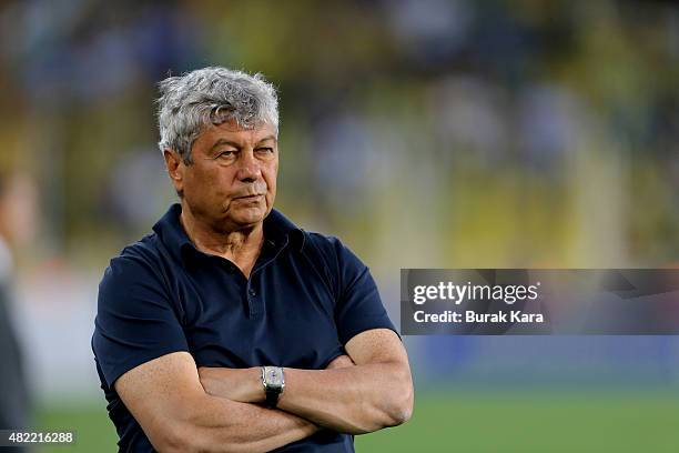 Shakhtar Donetsk's coach Mircea Lucescu watches the match during UEFA Champions League Third Qualifying Round 1st Leg match betweeen Fenerbahce v...