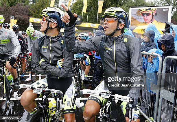 Rafal Majka of Poland and Tinkoff-Saxo talks to Alberto Contador of Spain and Tinkoff-Saxo before stage twenty one of the 2015 Tour de France, a...