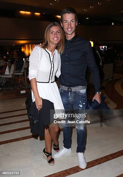 Mikael Cherel of France and AG2R La Mondiale and his wife Pascaline Cherel leave their hotel for the team's party, following stage twenty one of the...