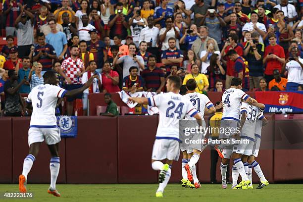 Eden Hazard of Chelsea celebrates with teammates after scoring against Barcelona in the first half during the International Champions Cup North...