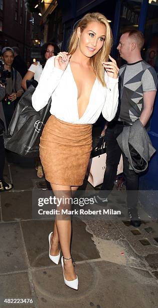 Chloe Goodman attending the Macmillan Cancer Support's one-off blow-dry bar on July 28, 2015 in London, England.