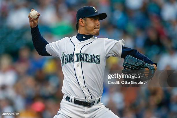 Starting pitcher Hisashi Iwakuma of the Seattle Mariners pitches in the first inning against the Arizona Diamondbacks at Safeco Field on July 28,...