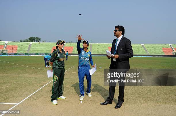 Sana Mir captain of Pakistan , Shashikala Sriwardena captain of Sri Lanka and ICC match referee Javagal Srinath during the toss before the start of...