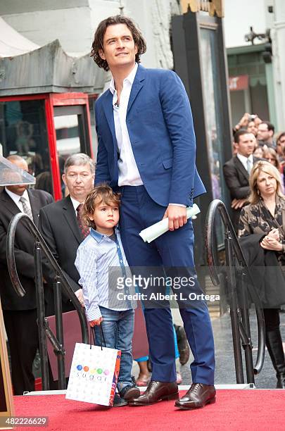 Actor Orlando Bloom and son Flynn Christopher Blanchard Copeland Bloom at The Hollywood Walk Of Fame ceremony honoring Orlando Bloom on April 2, 2014...