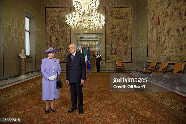 Italian President Giorgio Napolitano greets Her Majesty Queen Elizabeth II in the 'Sala del Bronzino' of the 'Palazzo del Quirinale' during her...
