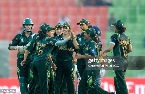 Anam Amin of Pakistan celebrates the wicket of Chamari Polgampola of Sri Lanka during the ICC Women's World Twenty20 7th/8th place ranking match...