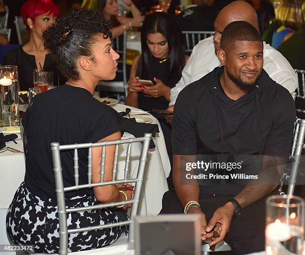 Grace Miguel and Usher attend the 10 Year Anniversary Celebration Dinner With Jeezy And The Street Dreams Foundation at 103 West on July 24, 2015 in...