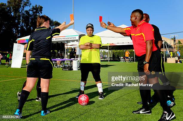 Starkey Hearing Foundation Ambassador Kyle Massey has fun with the referees as he participates in The Special Olympics Unified Sports Experience...