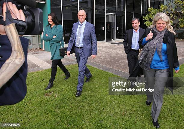 Horse Trainers Mark Kavanagh with wife Isobel Kavanagh and Danny O'Brien with wife Nina O'Brien leave the Racing Victoria hearing at Racing Victoria...