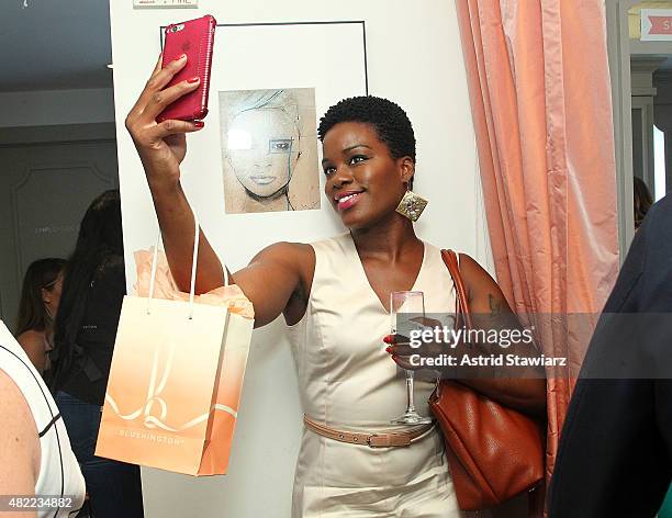 The Glamorous Gleam blogger, Erica Moore attends the Blushington New York City Grand Opening Party at Le Parker Meridien Underground on July 28, 2015...