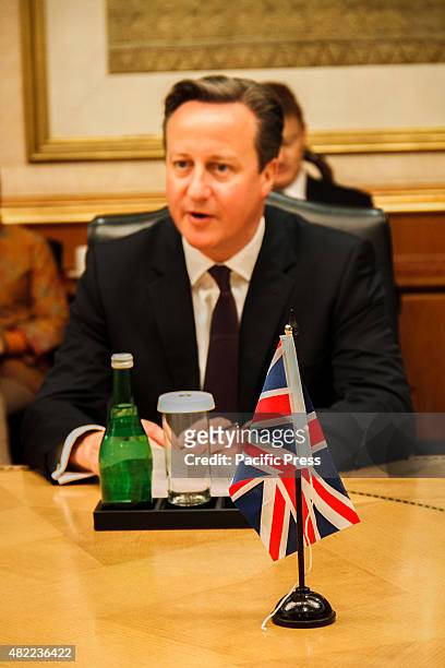 British Prime Minister David Cameron speaks during a roundtable meeting and discussion with Indonesian businessmen during the UK-Indonesia Business...
