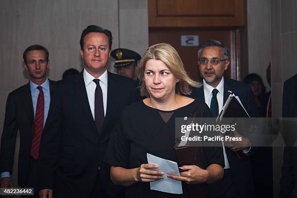 British Prime Minister David Cameron arrives for a roundtable meeting and discussion with Indonesian businessmen during the UK-Indonesia Business...