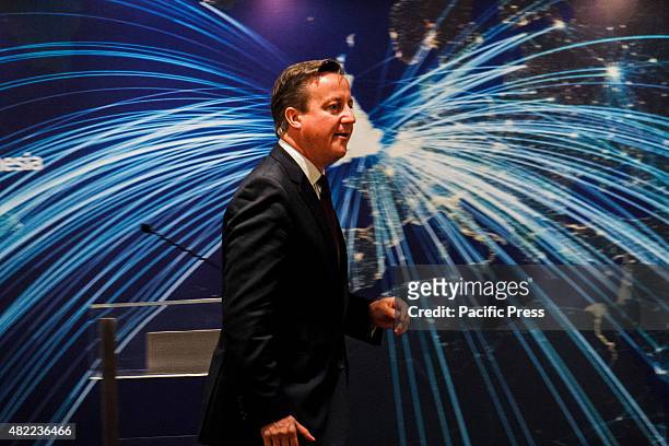 Britain's Prime Minister David Cameron gestures as he delivers his remarks during the UK-Indonesia Business Forum in Jakarta. British Prime Minister...
