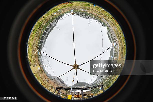 The Five hundred meter Aperture Spherical Telescope is built in mountains on July 28, 2015 in Pingtang County, Qiannan Buyei and Miao Autonomous...