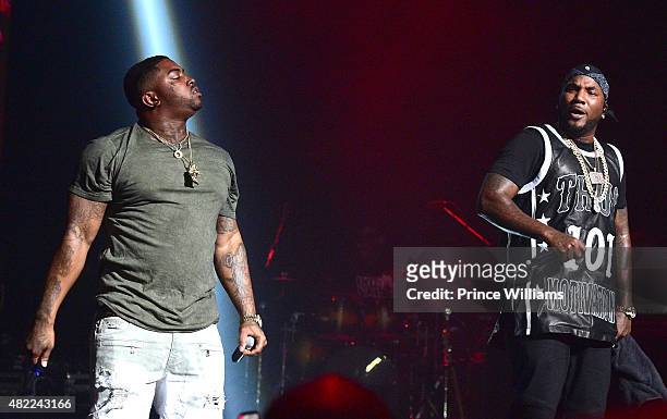 Lil Scrappy and Young Jeezy perform at Jeezy presents TM101: 10 year Anniversary Concert at The Fox Theatre on July 25, 2015 in Atlanta, Georgia.