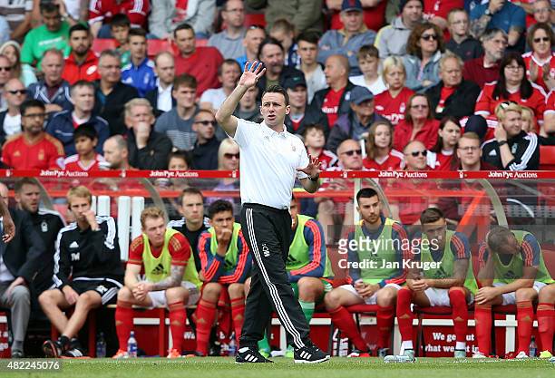 Nottingham Forest manager Dougie Freedman shouts encouragement during the pre season friendly match between Nottingham Forest and Swansea City at...