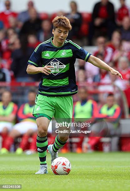Sung-Yeung Ki of Swansea City during the pre season friendly match between Nottingham Forest and Swansea City at City Ground on July 25, 2015 in...