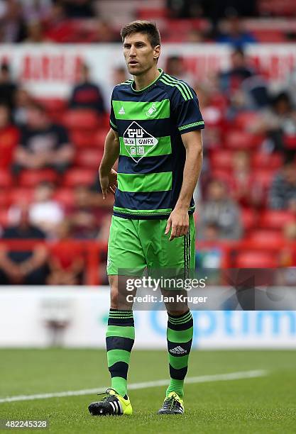 Federico Fernandez of Swansea City during the pre season friendly match between Nottingham Forest and Swansea City at City Ground on July 25, 2015 in...