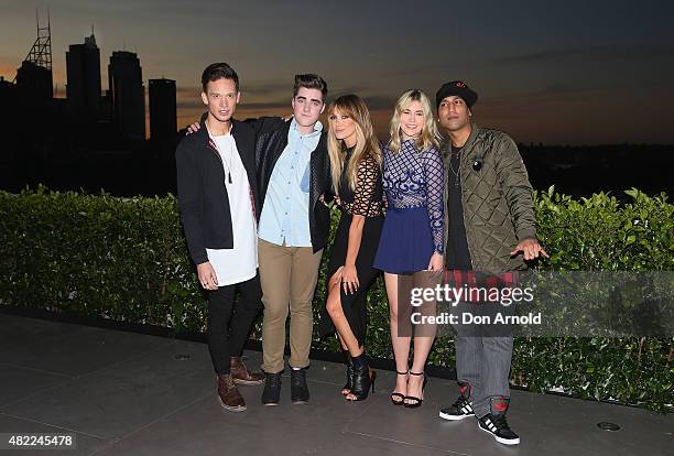 Delta Goodrem poses with her team during the Voice Live Finals Show Launch on July 29, 2015 in Sydney, Australia.
