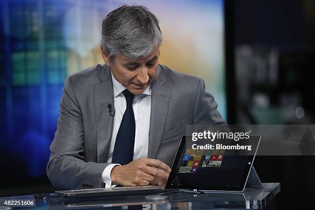 Jean-Philippe Courtois, president of Microsoft International, demonstrates features of Microsoft Corp.'s new Microsoft 10 operating system on a...