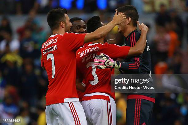 Players of Benfica celebrate with Ederson Moraes goalkeeper of Benfica after winning in a penalty shootout against America as part of the...
