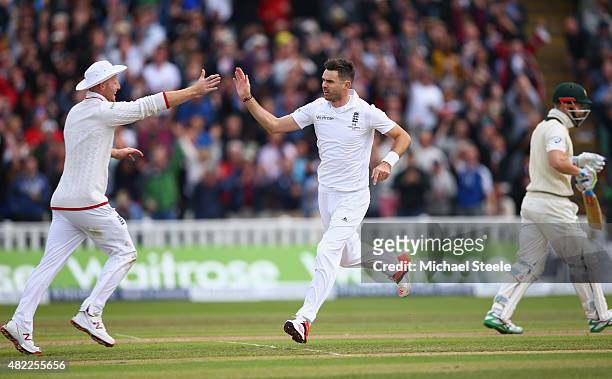 James Anderson of England celebrates with Adam Lyth after bowling Peter Nevill of Australia during day one of the 3rd Investec Ashes Test match...