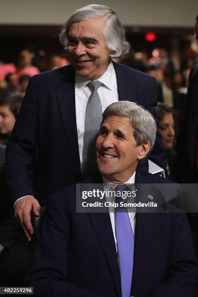 Secretary of State John Kerry and Energy Secretary Ernest Moniz take a break from testifying before the Senate Armed Services Committee about the...