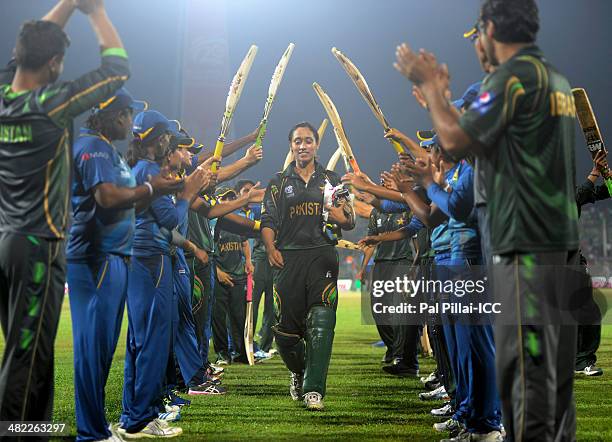 Syeda Batool of Pakistan receives a farewell from her teammates along with the Sri Lankan team as she declares her retirement from all form of...