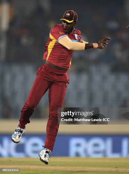 Darren Sammy of the West indies celebrates running out Mahela Jayawardene of Sri Lanka during the ICC World Twenty20 Bangladesh 2014 Semi Final match...