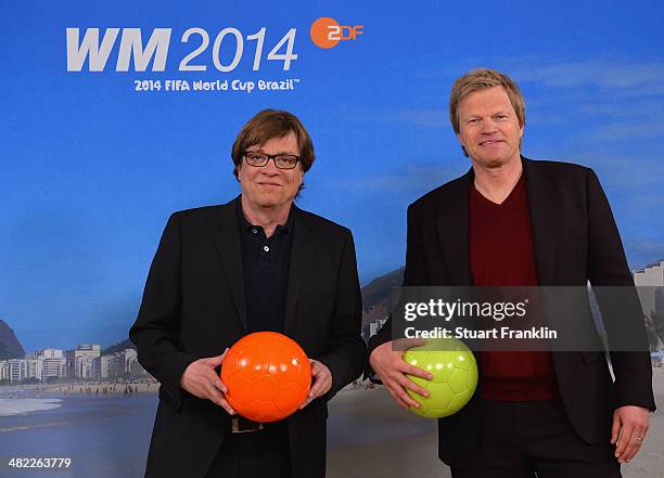 Television presenter Bela Rethy and football expert Oliver Kahn is pictured during the ARD/ZDF FIFA World Cup 2014 team presentation event on April...