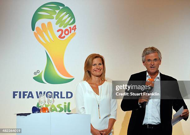 Presenter Katrin Müller-Hohenstein and Doctor Peter Frey, Chief editor of ZDF are pictured during the ARD/ZDF FIFA World Cup 2014 team presentation...