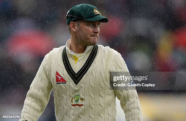 Australian captain Michael Clarke leaves the field as rain stops play during day one of the 3rd Investec Ashes Test match between England and...