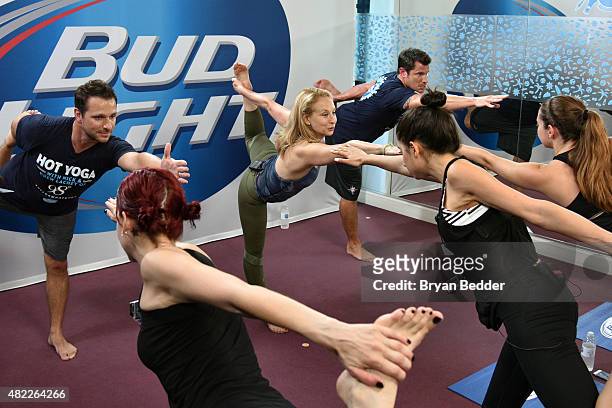 Bud Light helped two fans check "Hot Yoga" off their bucket list in UpForWhatever fashion by surprising them with Hot Yoga with Nick and Drew Lachey...