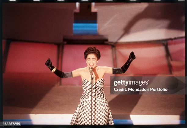 Italian singer Mia Martini performing on the stage of the Ariston Theatre during the 39th Sanremo Music Festival. Sanremo, February 1989