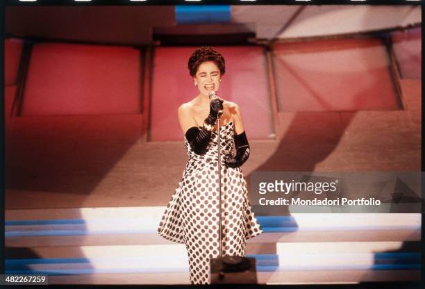 Italian singer Mia Martini performing on the stage of the Ariston Theatre during the 39th Sanremo Music Festival. Sanremo, February 1989