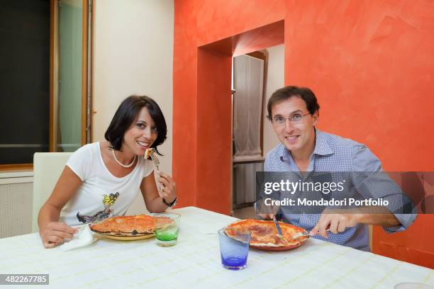 The Italian politician Nunzia De Girolam eats a pizza with her boyfriend, the italian politician Francesco Boccia. 2011