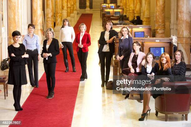 The Italian ministers and undersecretaries of Berlusconi's government pose smiling in the corridor of Palazzo Montecitorio. From the left: Mara...