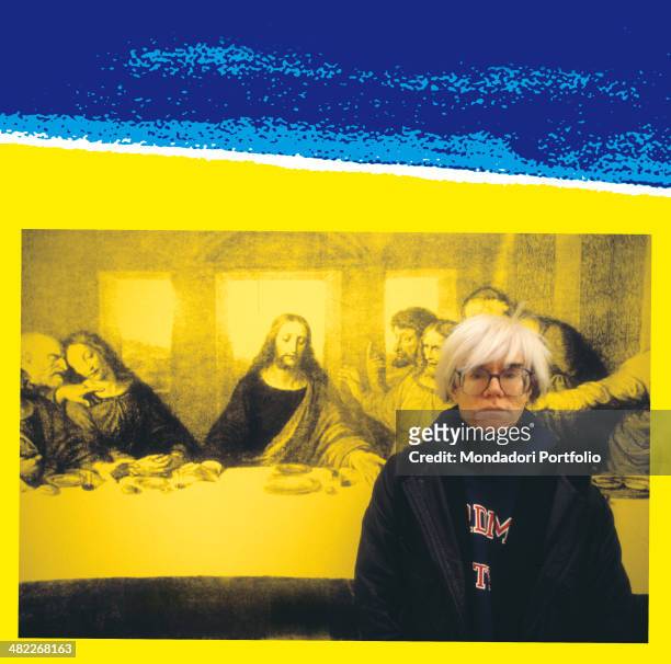 American all-round artist Andy Warhol, icon of the Pop Art Movement, poses in front of The Last Supper, a personal interpretation the American artist...