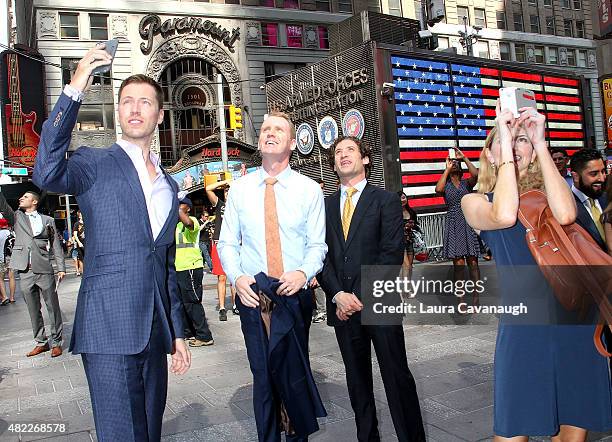 Andrew Greenwell and Justin Fichelson attend "Million Dollar Listing San Francisco" Rings The Nasdaq Stock Market Opening Bell at NASDAQ MarketSite...