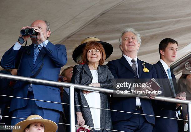 Alan Rickman and wife Rima Horton attend day two of the Qatar Goodwood Festival at Goodwood Racecourse on July 29, 2015 in Chichester, England.