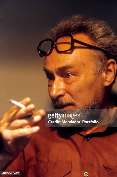 Italian writer Primo Levi smoking. Turin, 1981