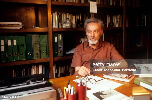 Italian writer Primo Levi sitting in his studio. Turin, 1981
