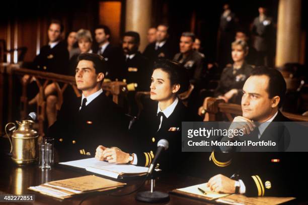 American actors Tom Cruise, Demi Moore and Kevin Pollack attending a trial in the film A Few Good Men. 1992