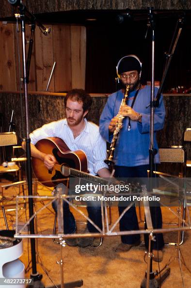 Lucio Dalla and Francesco De Gregori playing clarinet and guitar Lucio Dalla and Francesco De Gregori playing clarinet and guitar